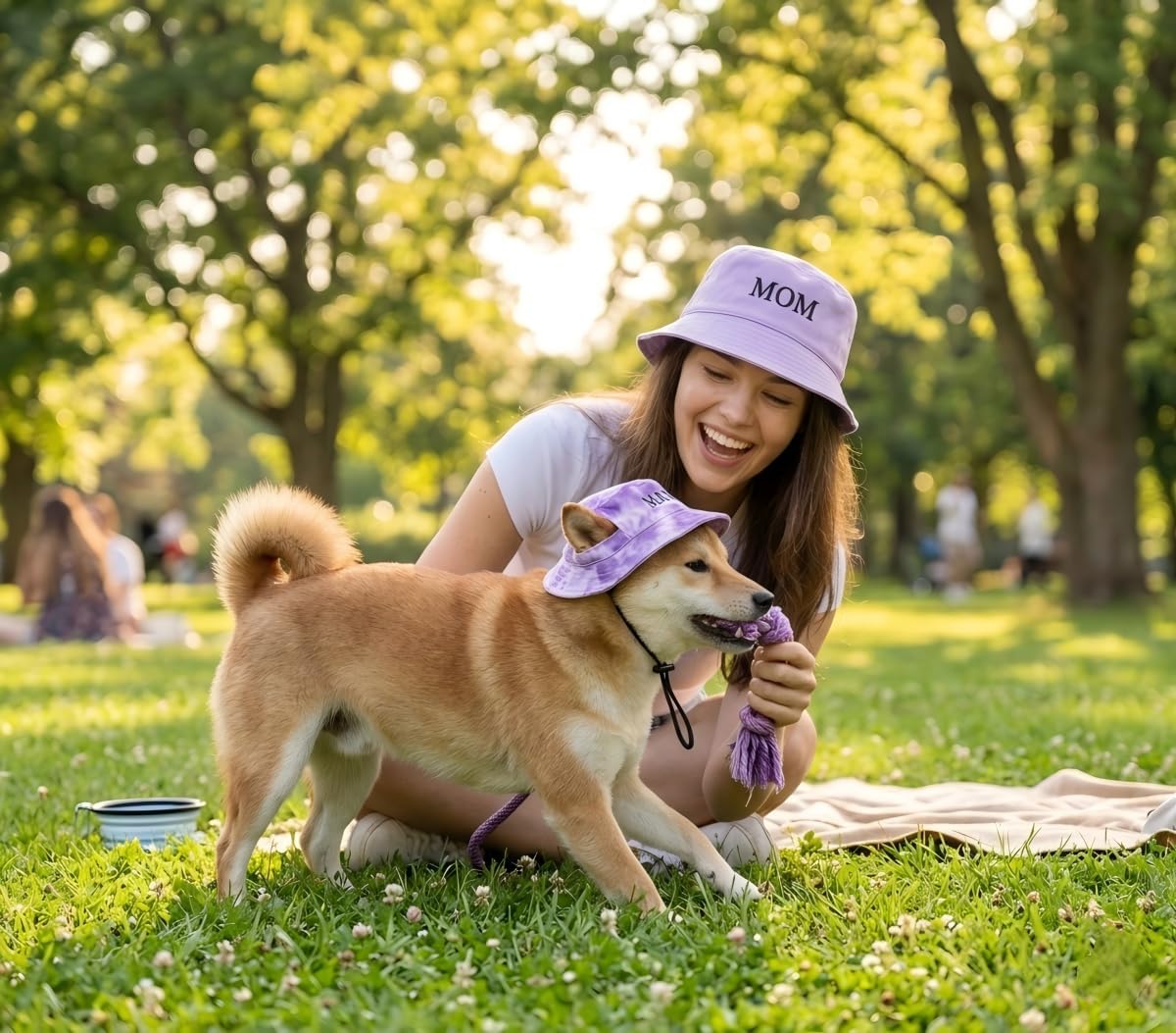 dog and owner wearing hats