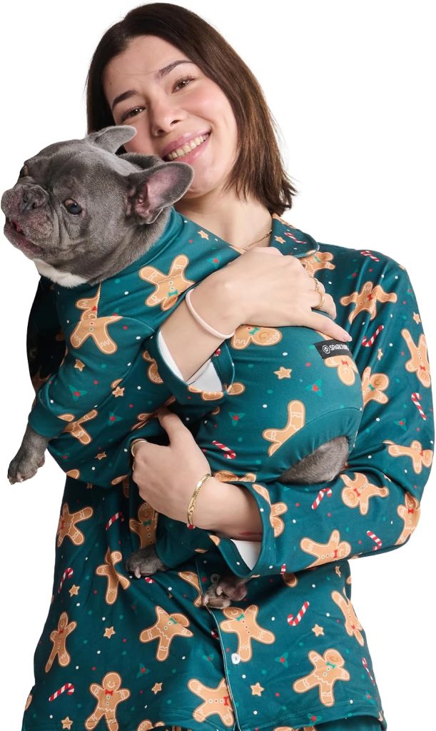 dog and woman wearing matching pjs