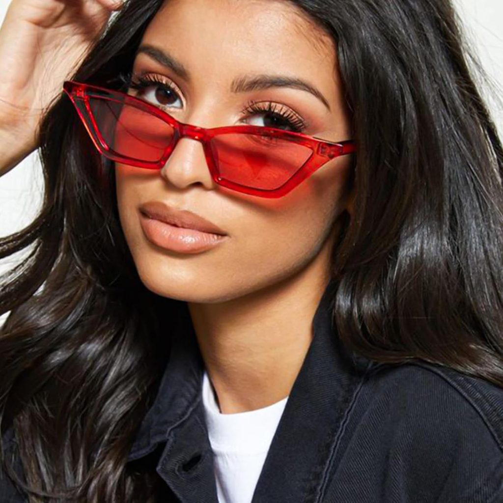 woman wearing red sunglasses