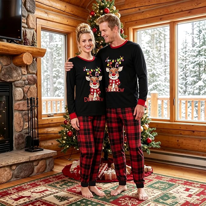 woman and man wearing matching holiday pajamas