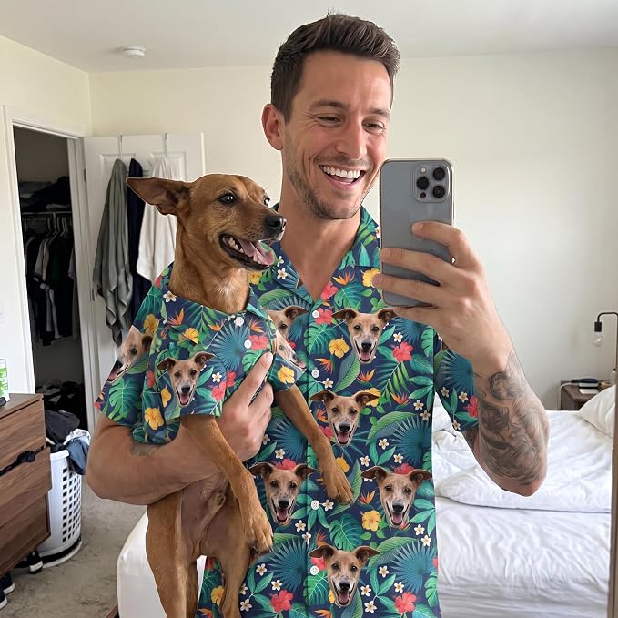 man and dog wearing matching shirts