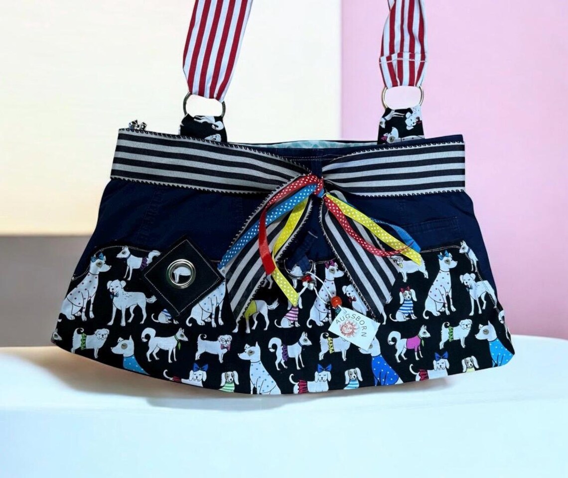 black bag with dog faces